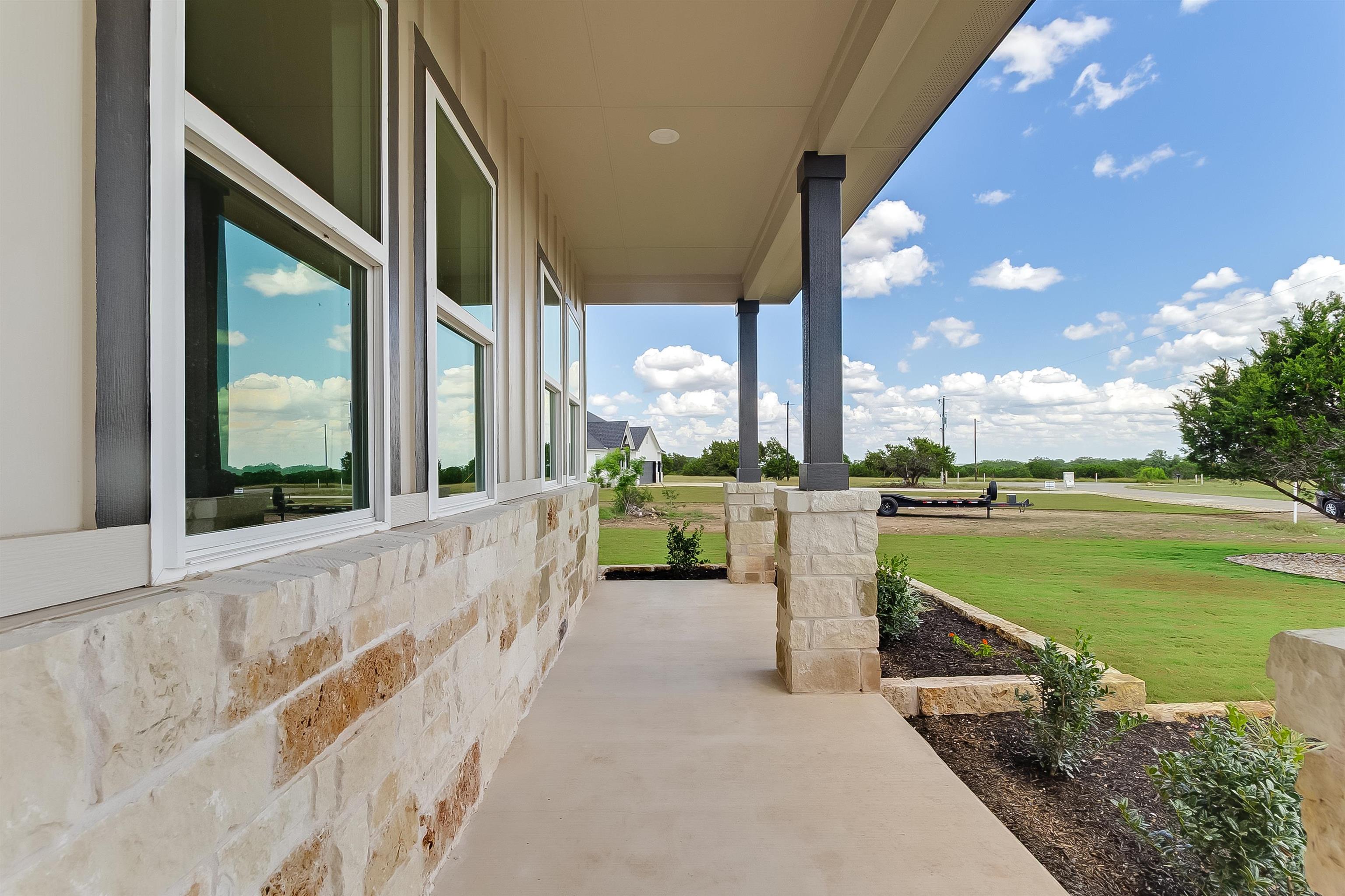 124 Draper Lane Bertram, TX 78605 - Photo 4 of 30 a view of a balcony with lake view