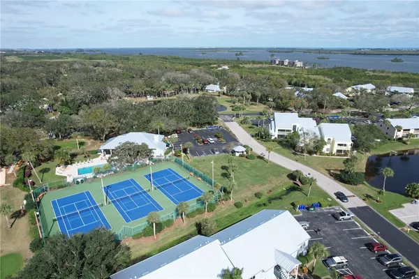 an aerial view of a house with a garden