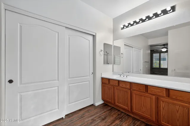 a kitchen with stainless steel appliances granite countertop a refrigerator a stove a sink dishwasher and a microwave oven