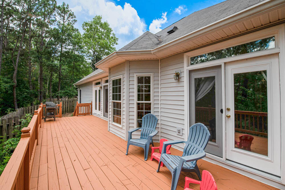 132 Riviera Road Aiken, SC 29803 - Photo 28 of 32 New doors to three access points to back deck overlooking fenced side yard and offering lots of privacy in the back!