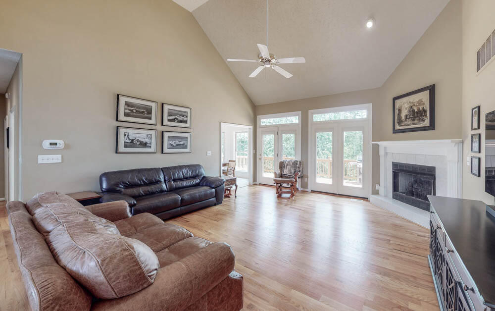 132 Riviera Road Aiken, SC 29803 - Photo 9 of 32 Living room with soaring ceilings & fireplace!