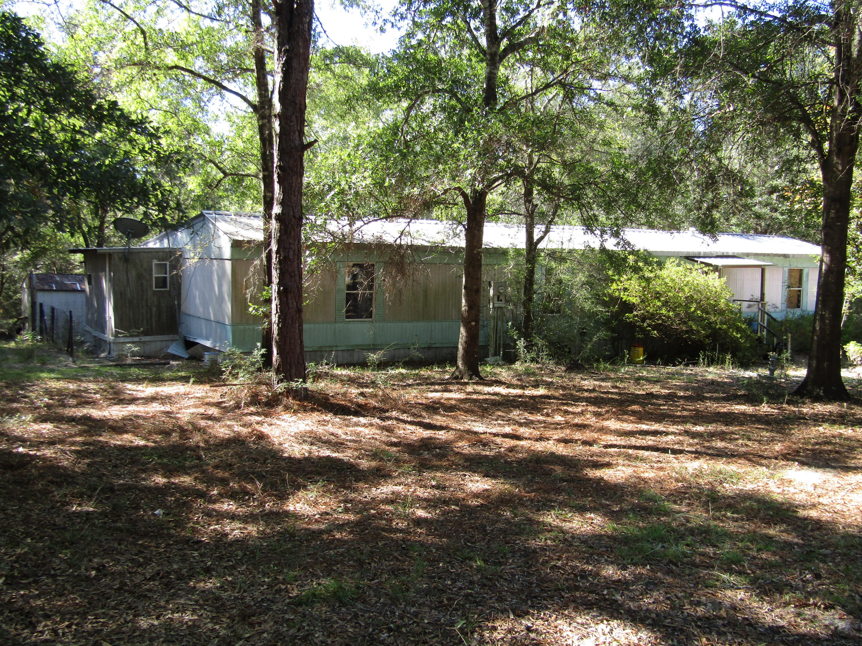 3996 Poverty Creek Road Crestview, FL 32539 - Photo 2 of 2 a view of a house with a yard