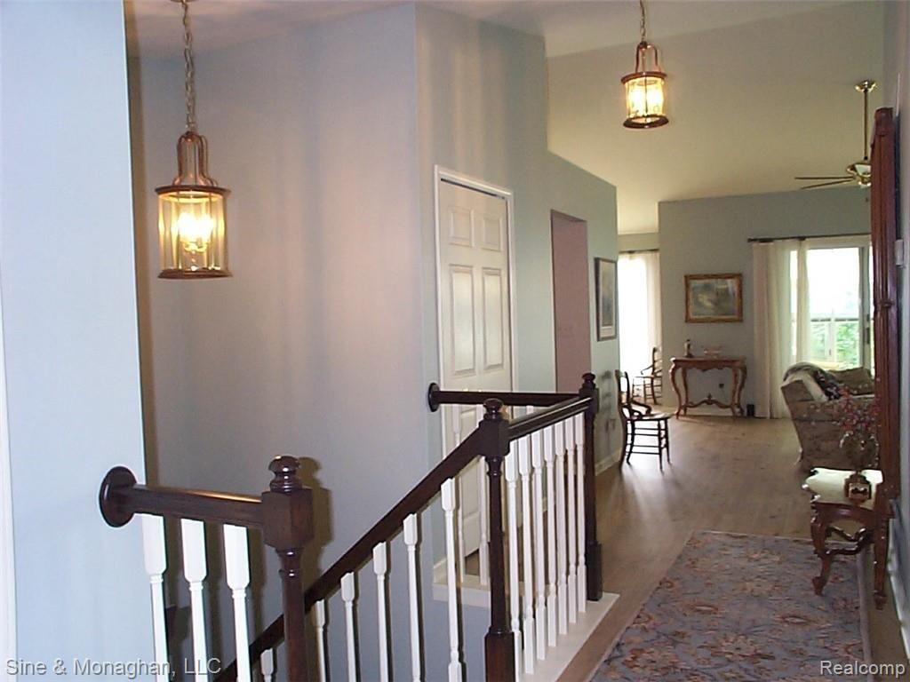 1935 River Road, Unit 23 St. Clair, MI 48079 - Photo 32 of 69 31 Staircase & hall 1935 River #23.JPG