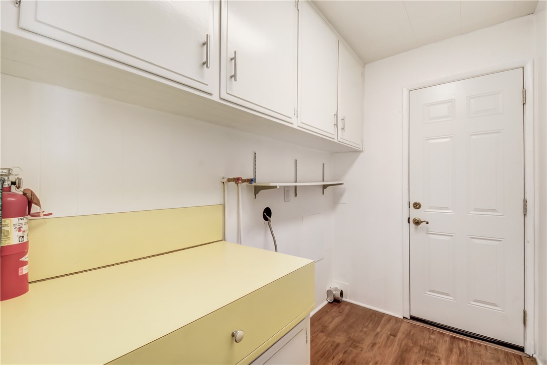 33828 Plowshare Road Wildomar, CA 92595 - Photo 12 of 22 a utility room with dryer and washer