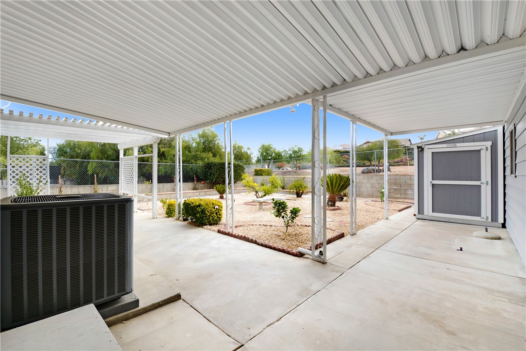 33828 Plowshare Road Wildomar, CA 92595 - Photo 20 of 22 a building outdoor space with patio furniture and garden