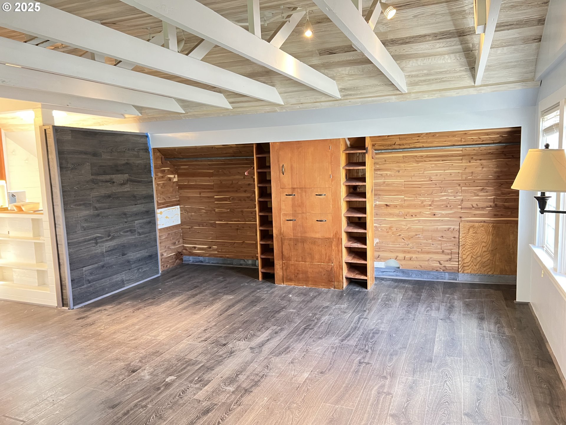 175 Baltimore Street Heppner, OR 97836 - Photo 17 of 28 a view of an empty room with wooden floor and a window