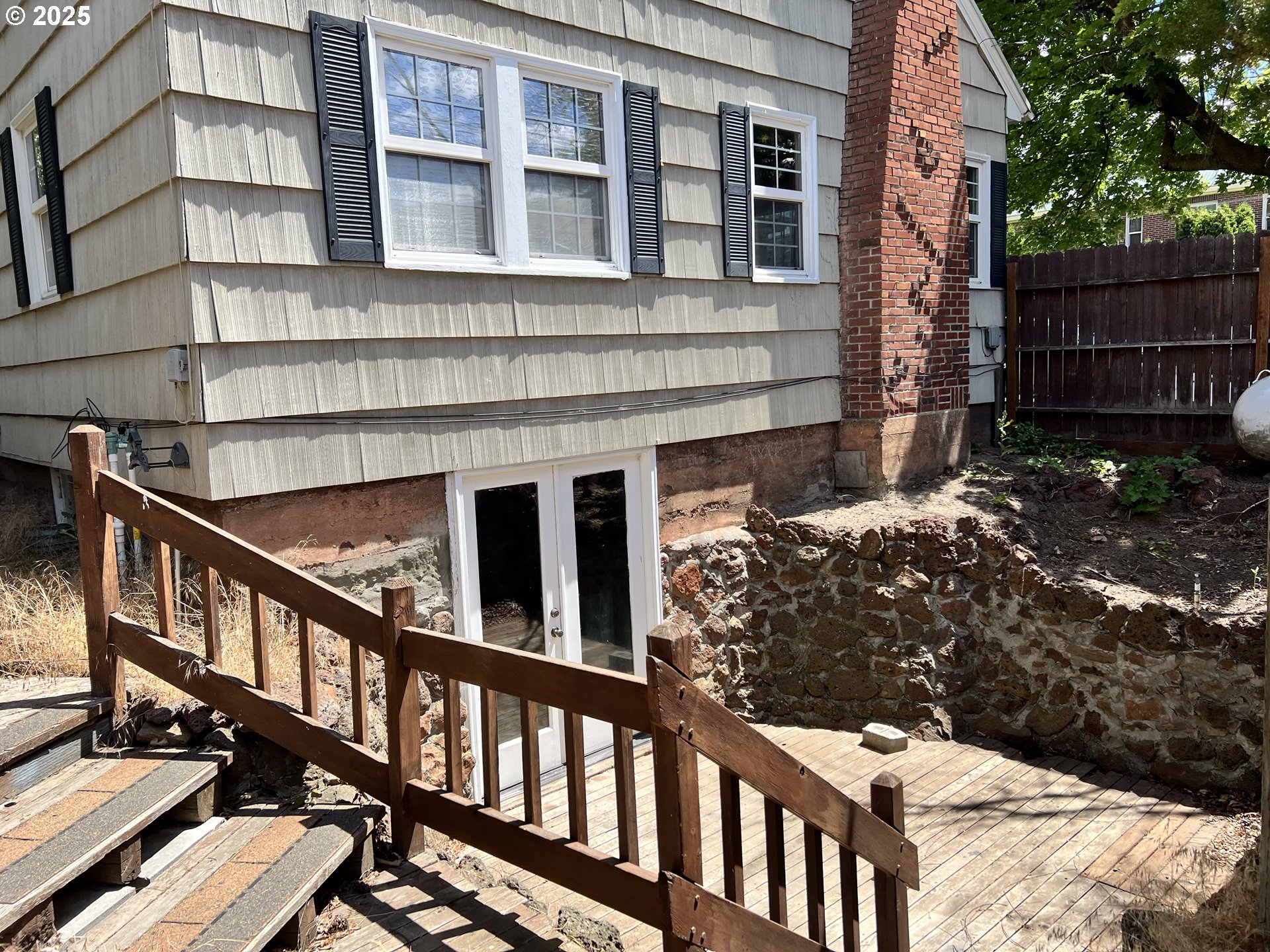 175 Baltimore Street Heppner, OR 97836 - Photo 23 of 28 a view of staircase with large windows