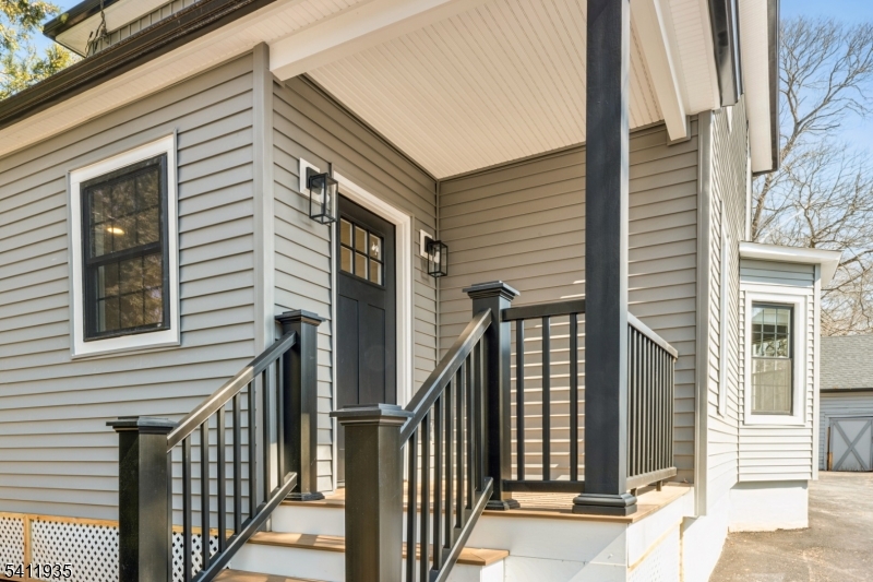 64 Hillcrest Road Watchung, NJ 07069 - Photo 3 of 42 a view of a house with a porch