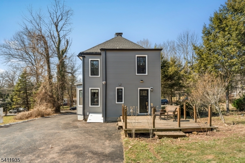 64 Hillcrest Road Watchung, NJ 07069 - Photo 35 of 42 a front view of a house with a yard
