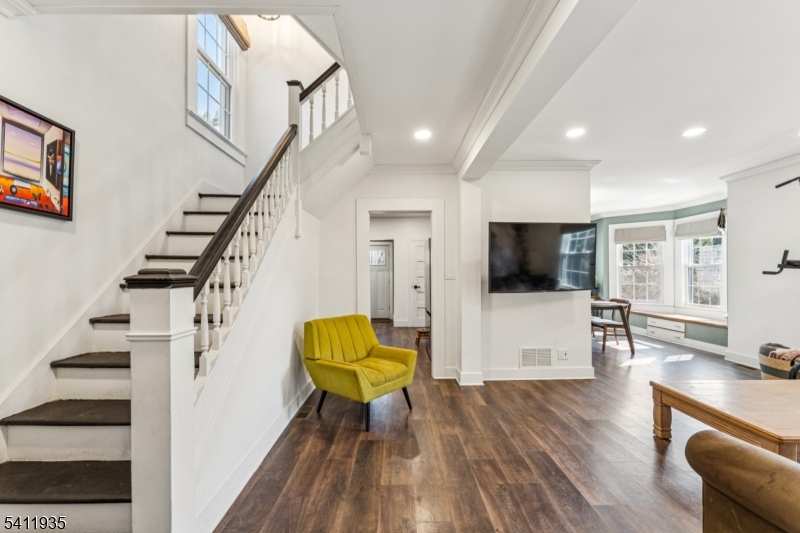 64 Hillcrest Road Watchung, NJ 07069 - Photo 6 of 42 a living room with furniture and a flat screen tv