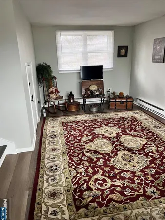 a living room with a couch and a flat screen tv