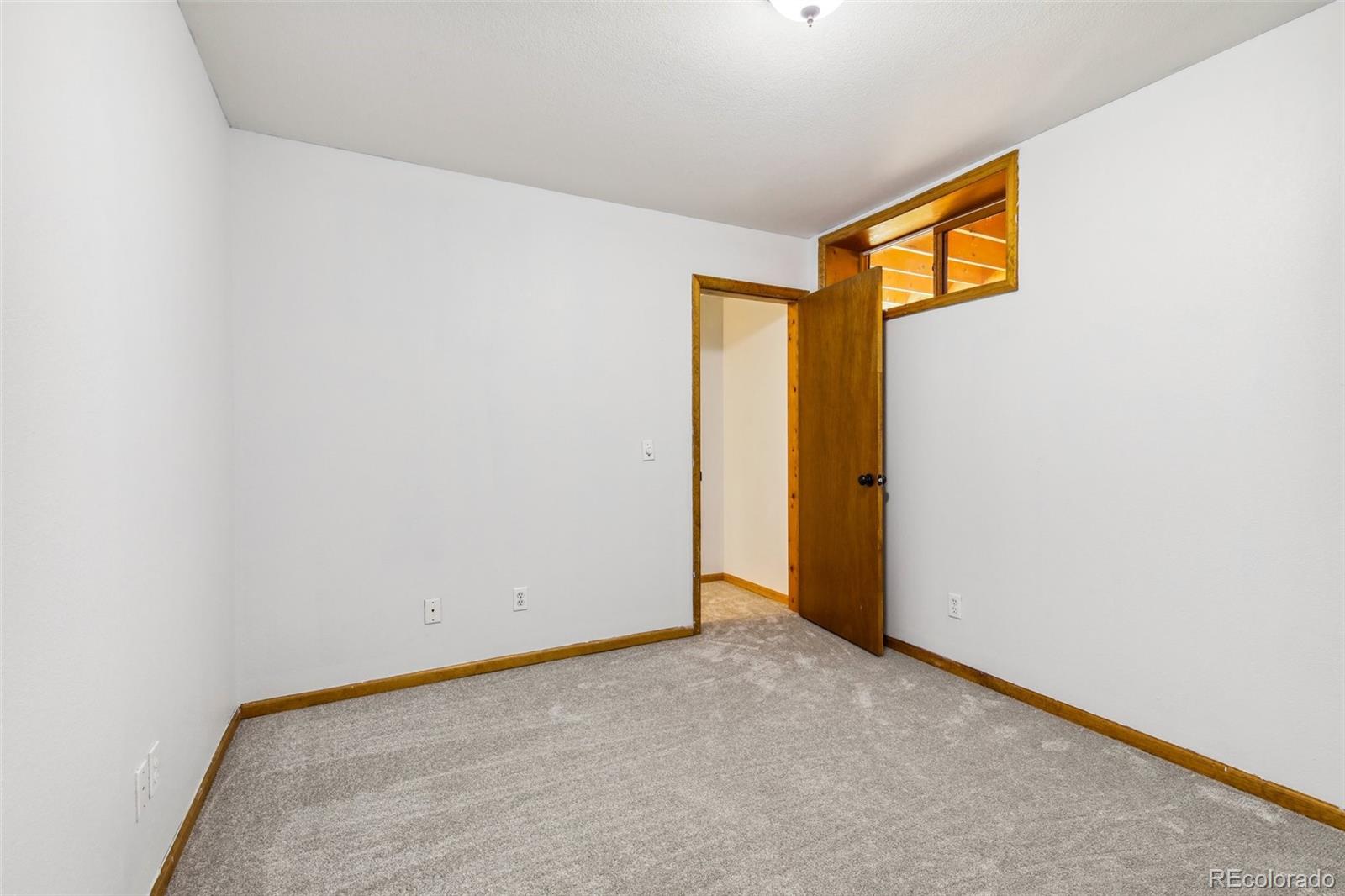 141 Tall Timber Lane Bailey, CO 80421 - Photo 27 of 40 a view of an empty room