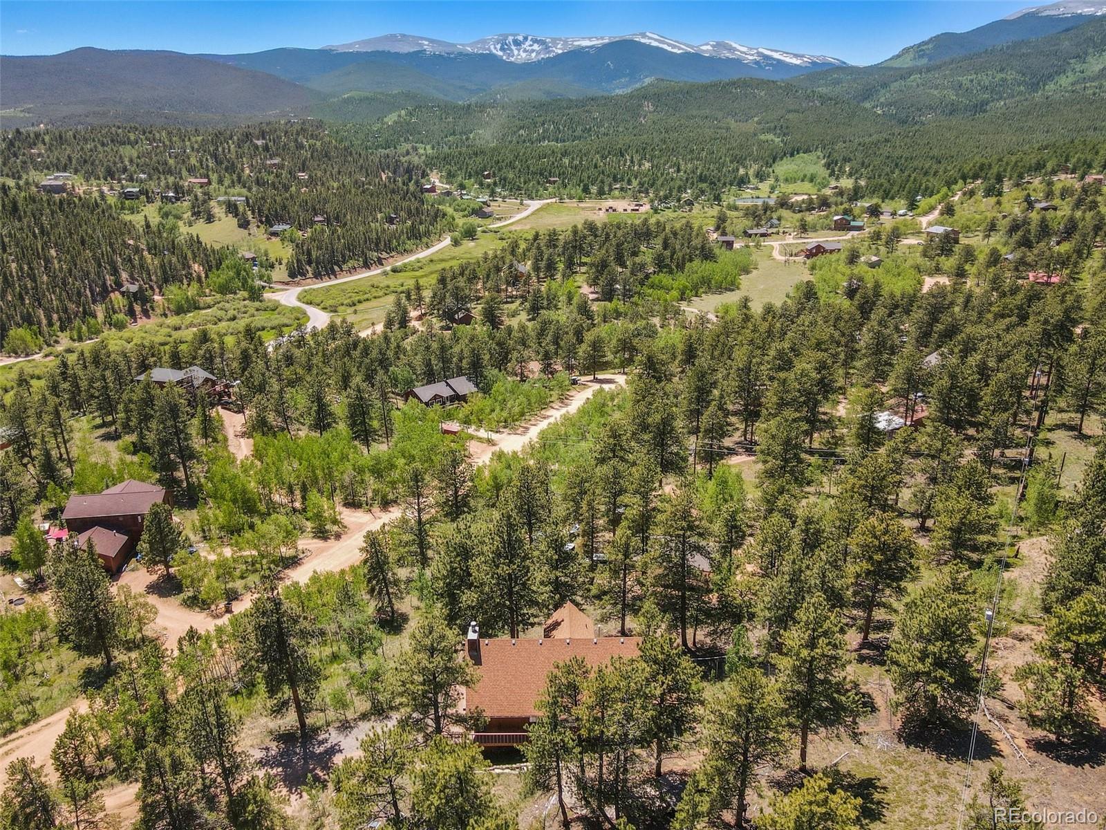 141 Tall Timber Lane Bailey, CO 80421 - Photo 3 of 40 a view of a city with mountain