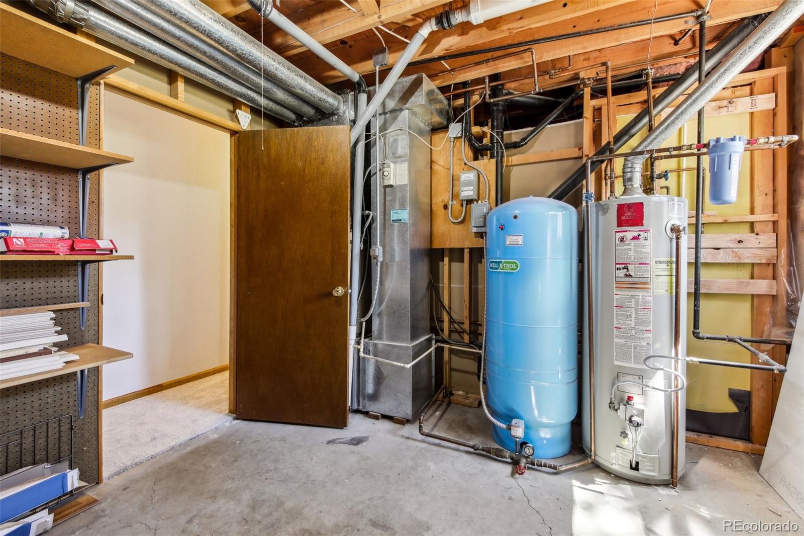 141 Tall Timber Lane Bailey, CO 80421 - Photo 36 of 40 a view of a refrigerator with storage