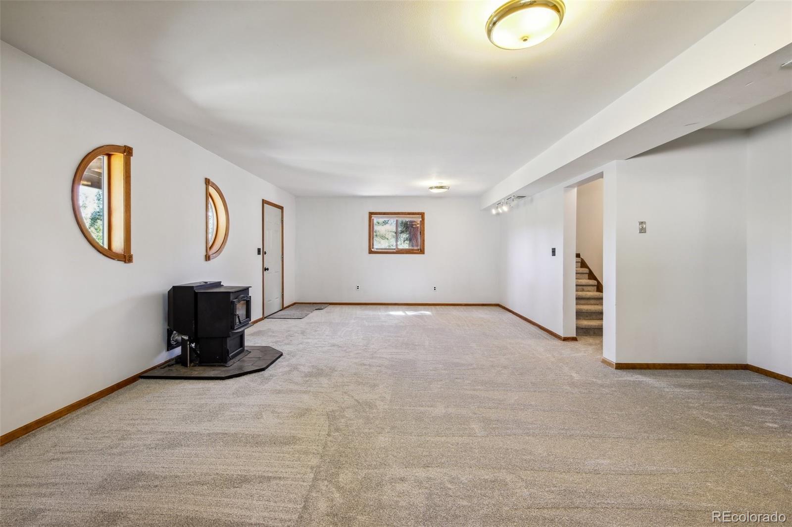 141 Tall Timber Lane Bailey, CO 80421 - Photo 40 of 40 a view of a livingroom with furniture