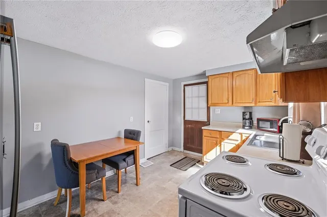 a workspace with furniture and window