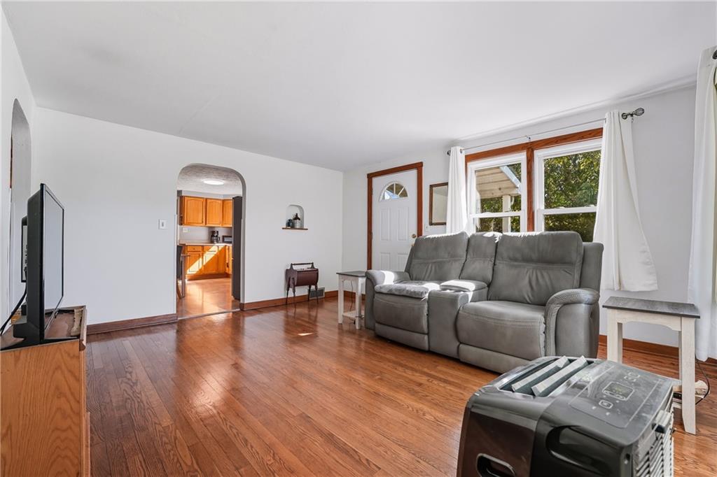 105 Williamson Road Greenville, PA 16125 - Photo 15 of 27 a living room with furniture and a flat screen tv