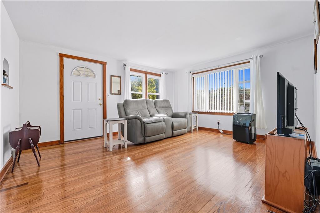 105 Williamson Road Greenville, PA 16125 - Photo 16 of 27 a living room with furniture window and a flat screen tv