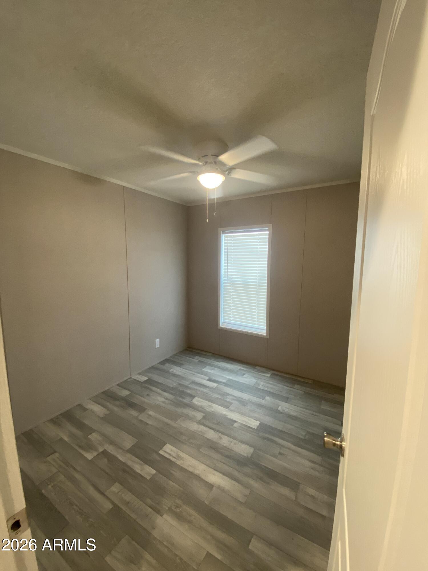 519 South Ortega Road Stanfield, AZ 85172 - Photo 23 of 29 a view of an empty room and window