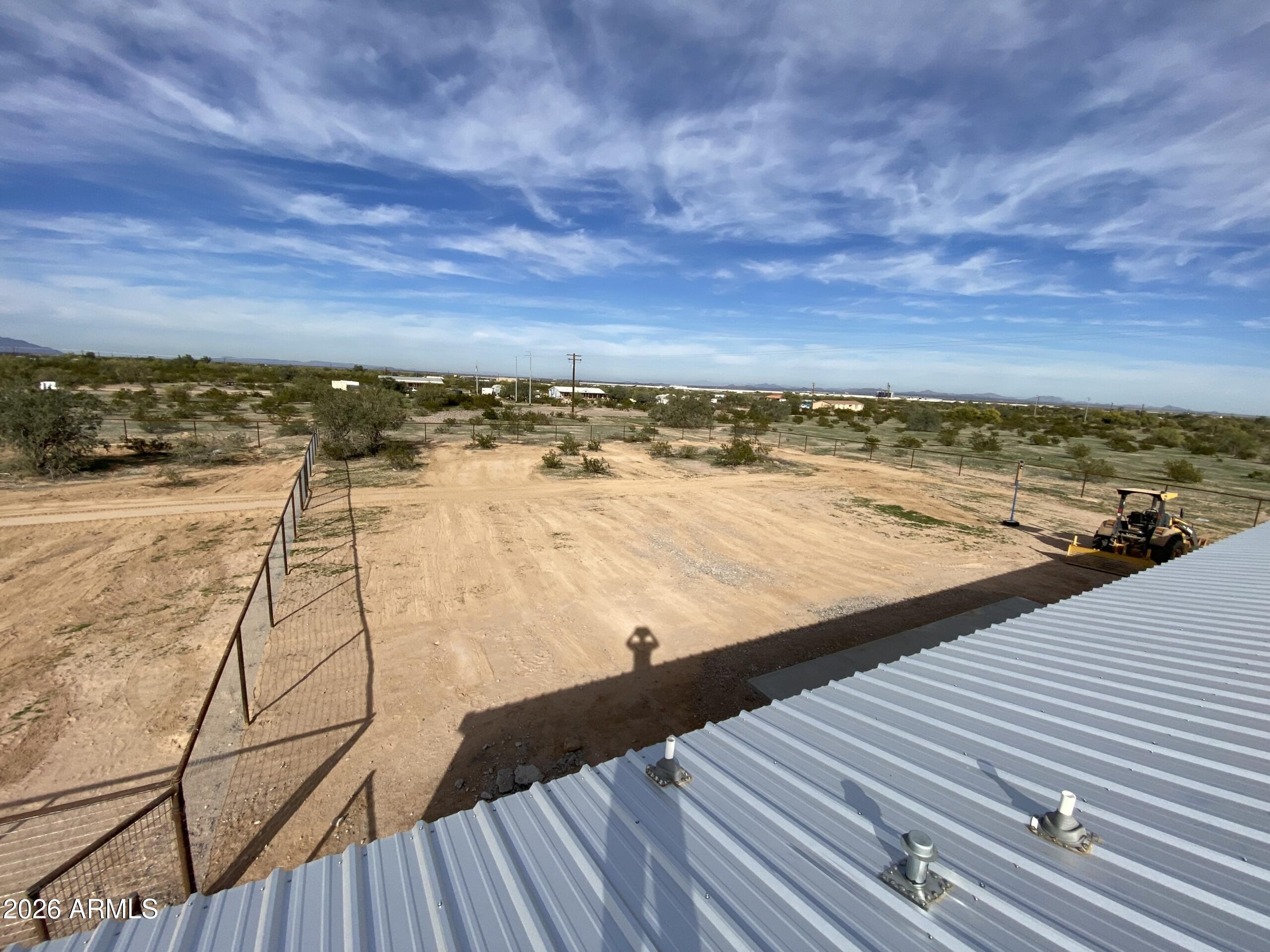 519 South Ortega Road Stanfield, AZ 85172 - Photo 7 of 29 a view of a terrace with wooden floor and ocean view