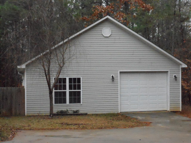 661 Altman Road Gray, GA 31032 - Photo 3 of 9 a front view of a house