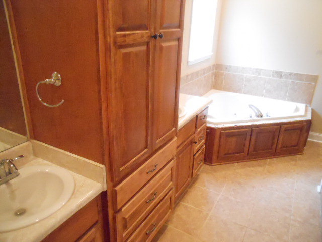661 Altman Road Gray, GA 31032 - Photo 6 of 9 a bathroom with a tub sink and mirror