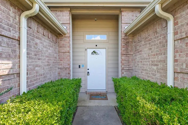 a view of front door of a house with stairs