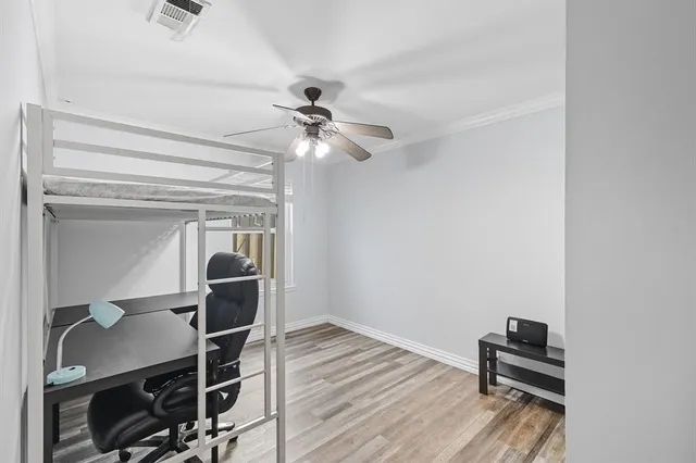 a view of workspace with wooden floor and workspace