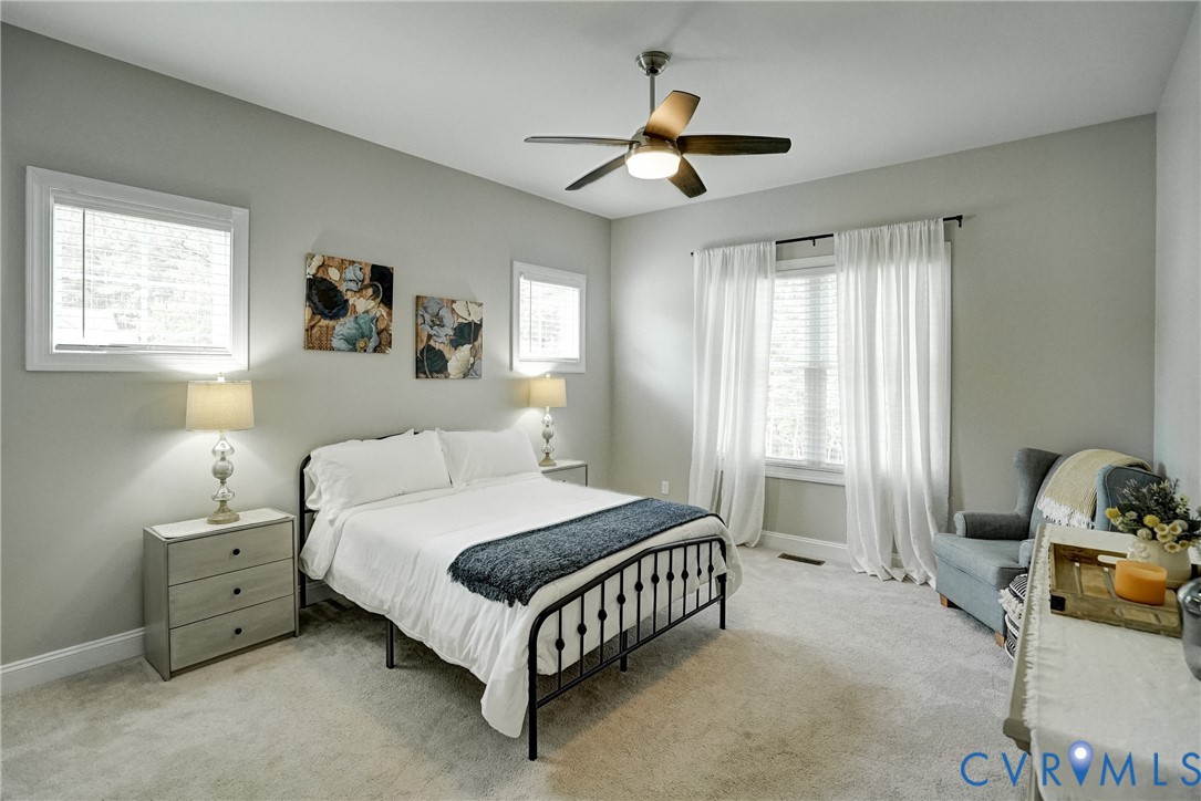 4669 Woburn Road Providence Forge, VA 23140 - Photo 26 of 78 a bedroom with a bed furniture and window