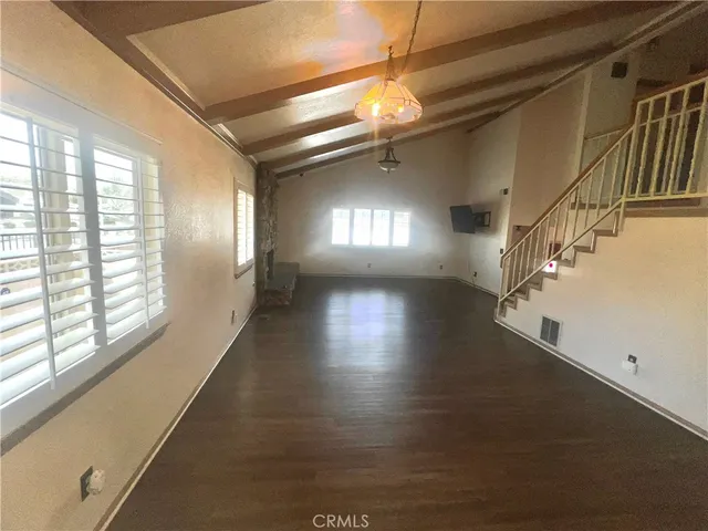 a view of gallery with wooden floor