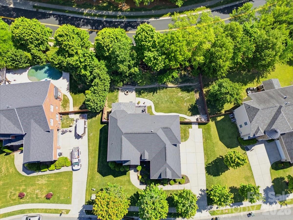 1825 Laveta Road Charlotte, NC 28269 - Photo 46 of 48 an aerial view of residential houses with outdoor space and swimming pool
