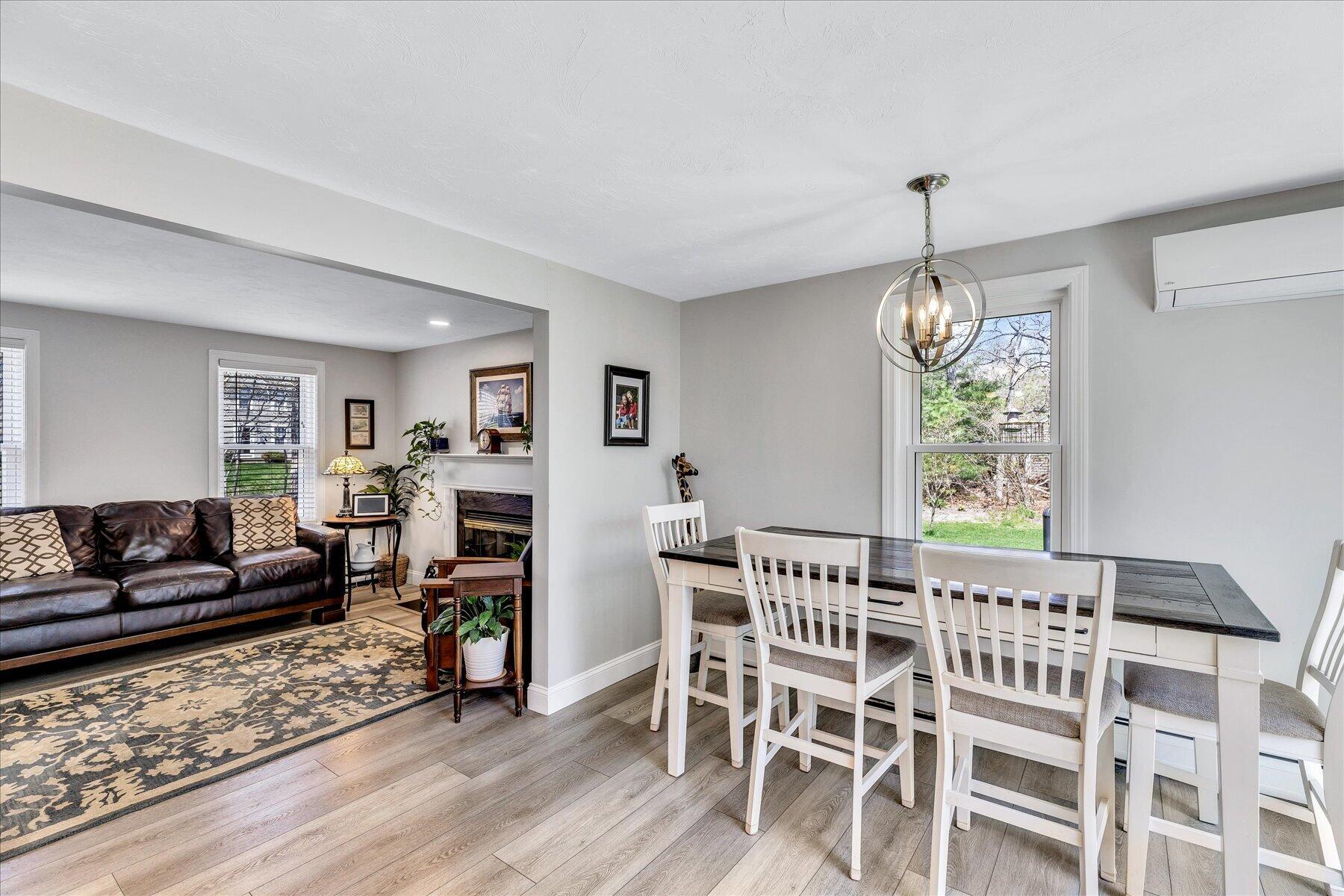 12 Drew Lane Mashpee, MA 02649 - Photo 13 of 49 a view of a livingroom with furniture window and wooden floor
