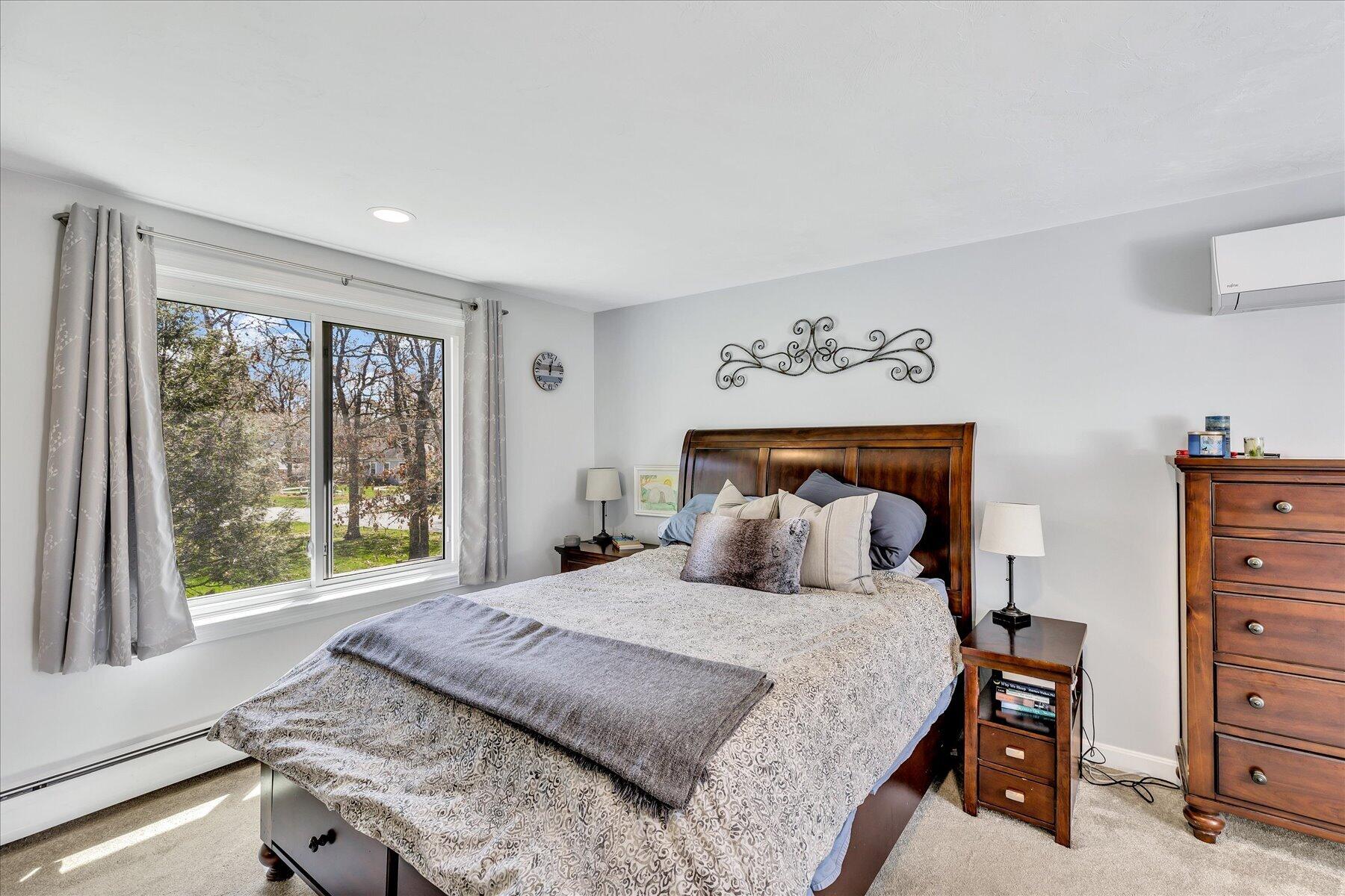 12 Drew Lane Mashpee, MA 02649 - Photo 27 of 49 a bedroom with a large bed and a window