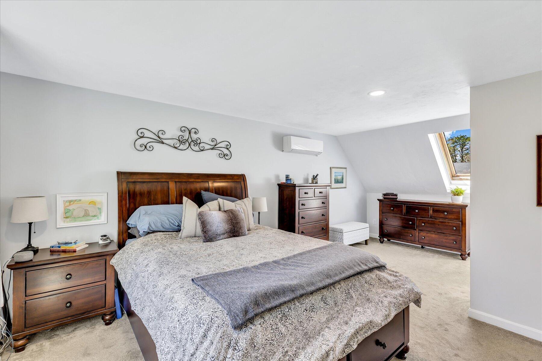 12 Drew Lane Mashpee, MA 02649 - Photo 29 of 49 a bedroom with a large bed and a furniture