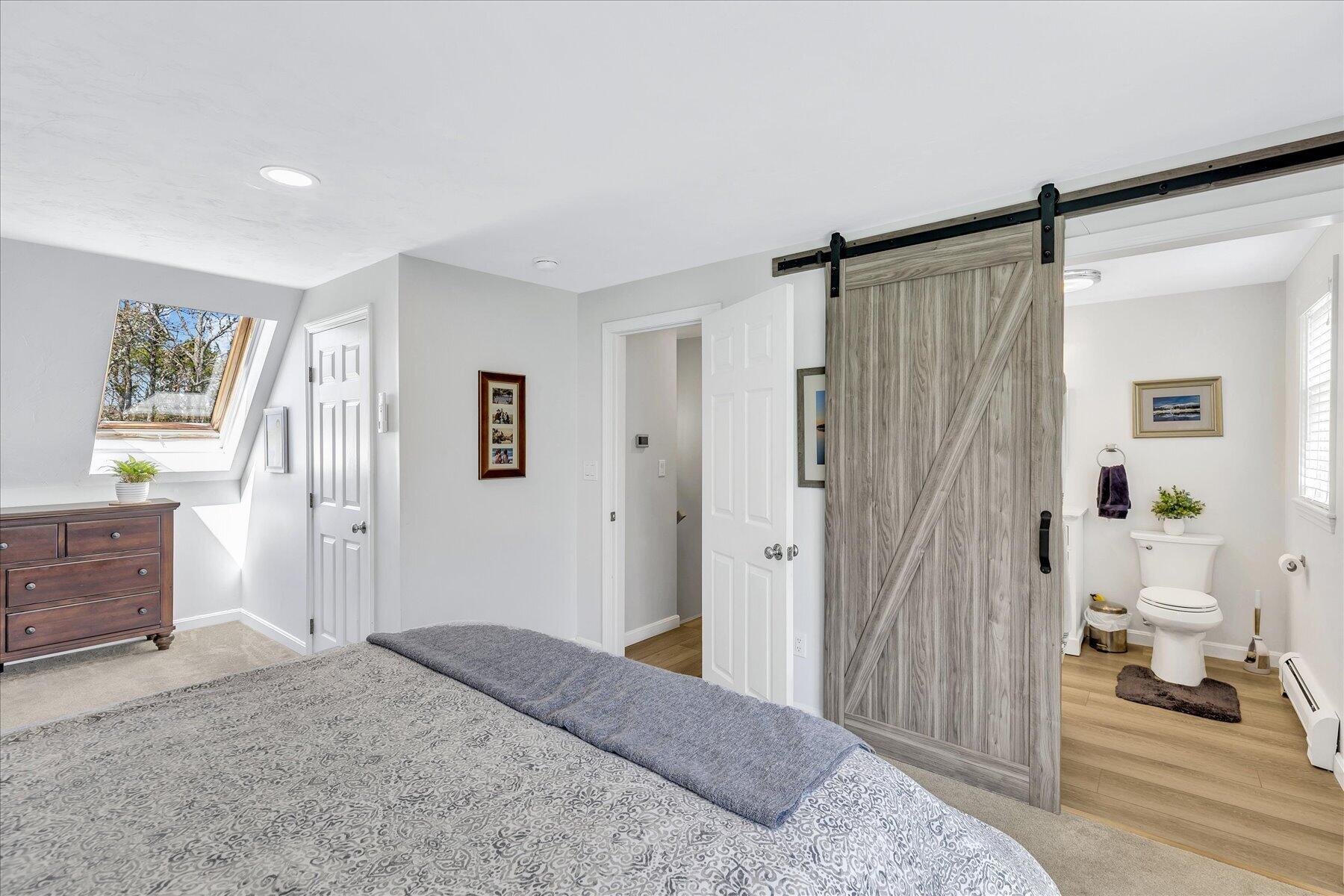 12 Drew Lane Mashpee, MA 02649 - Photo 30 of 49 a bedroom with a bed and a window