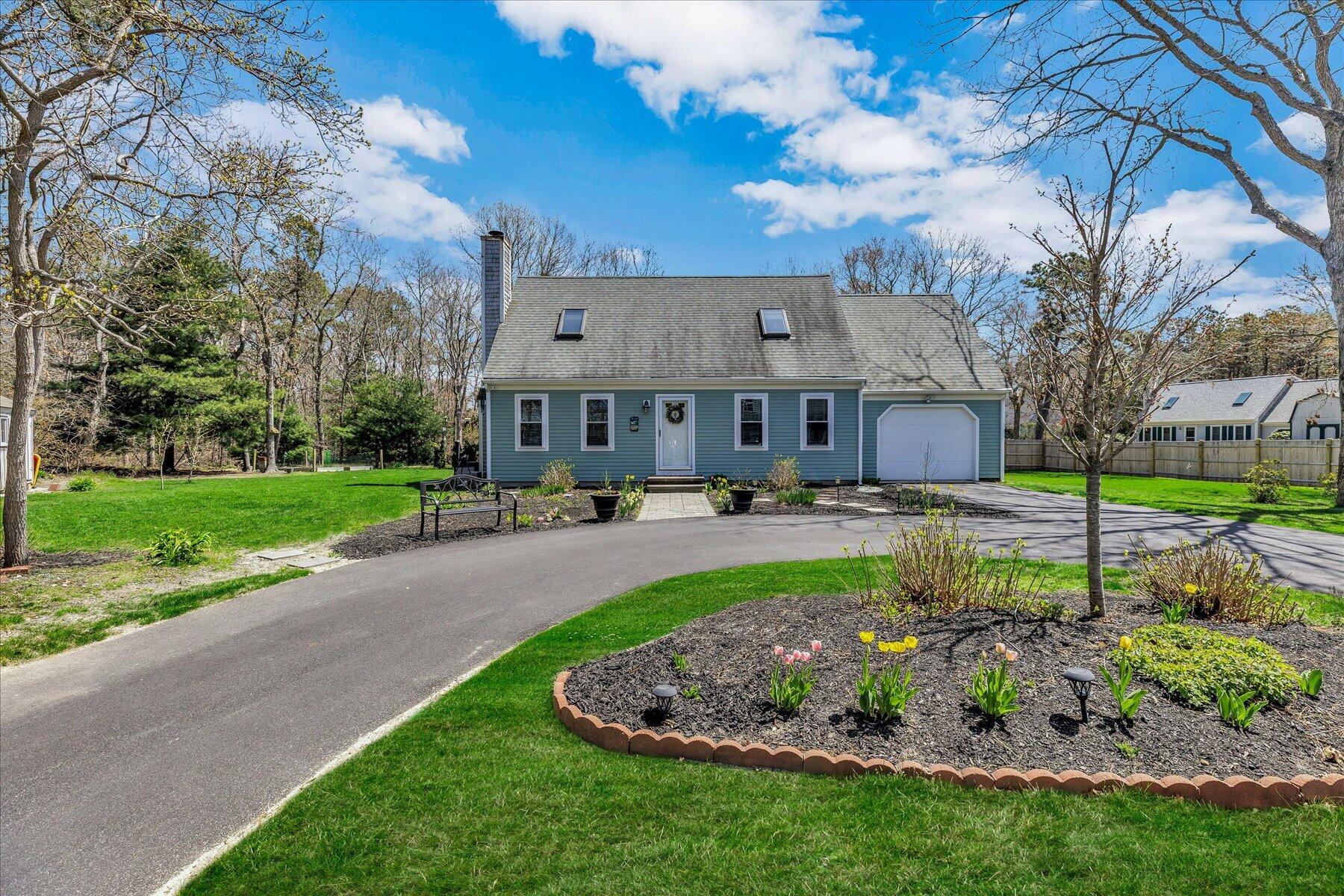 12 Drew Lane Mashpee, MA 02649 - Photo 3 of 49 a swimming pool with outdoor seating and yard