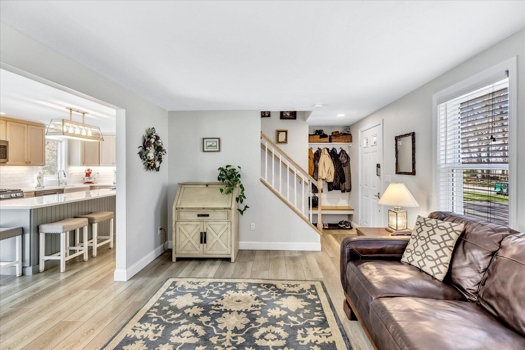 12 Drew Lane Mashpee, MA 02649 - Photo 4 of 49 a living room with furniture and a wooden floor