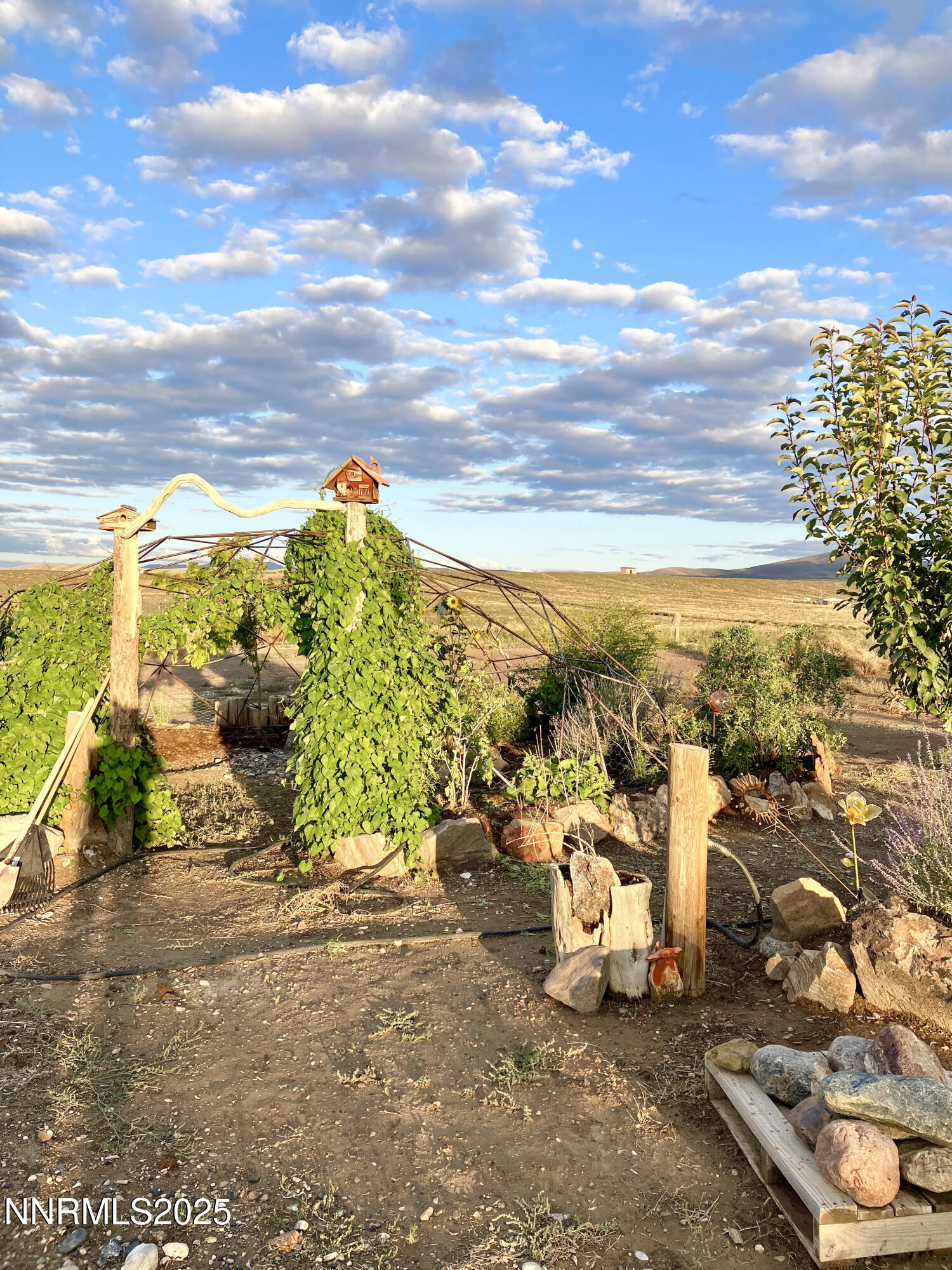 52 Horseshoe Circle Crescent Valley, NV 89821 - Photo 13 of 67 a view of a terrace with a bench