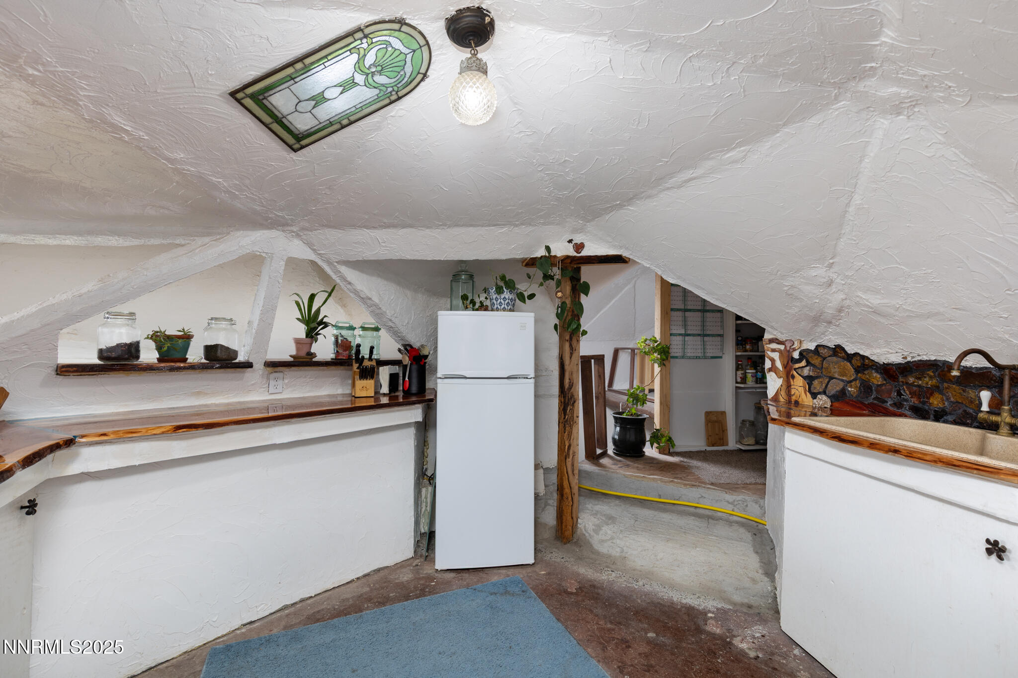 52 Horseshoe Circle Crescent Valley, NV 89821 - Photo 27 of 67 a view of a hallway to a livingroom and a window