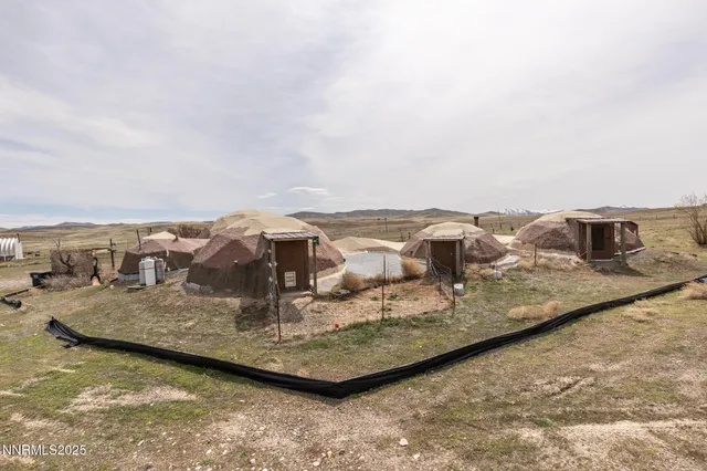 a view of a large body of water with a building in the background