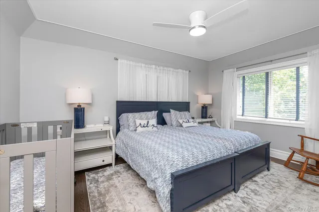 a bedroom with a large bed and a table