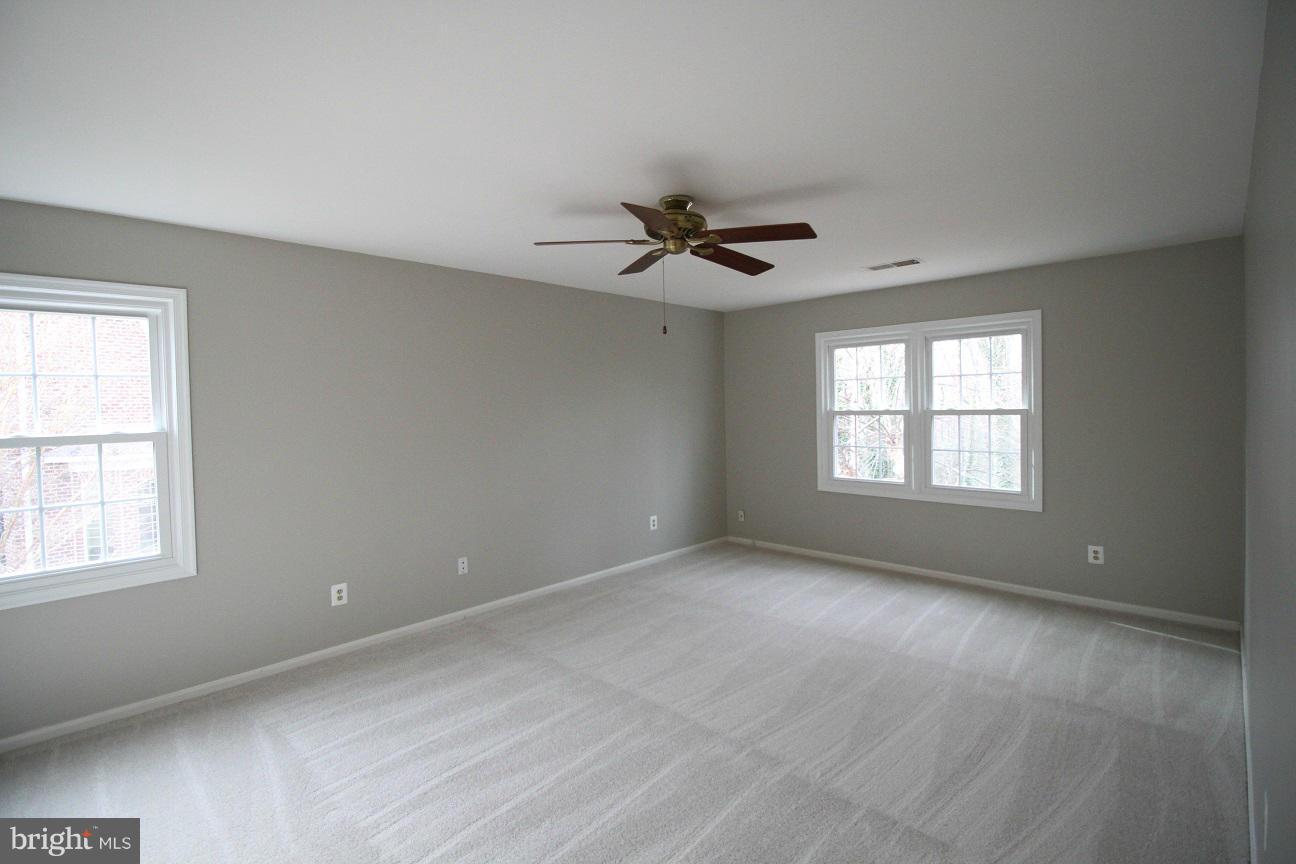 2646 Wild Cherry Place Reston, VA 20191 - Photo 12 of 26 a view of an empty room with a window