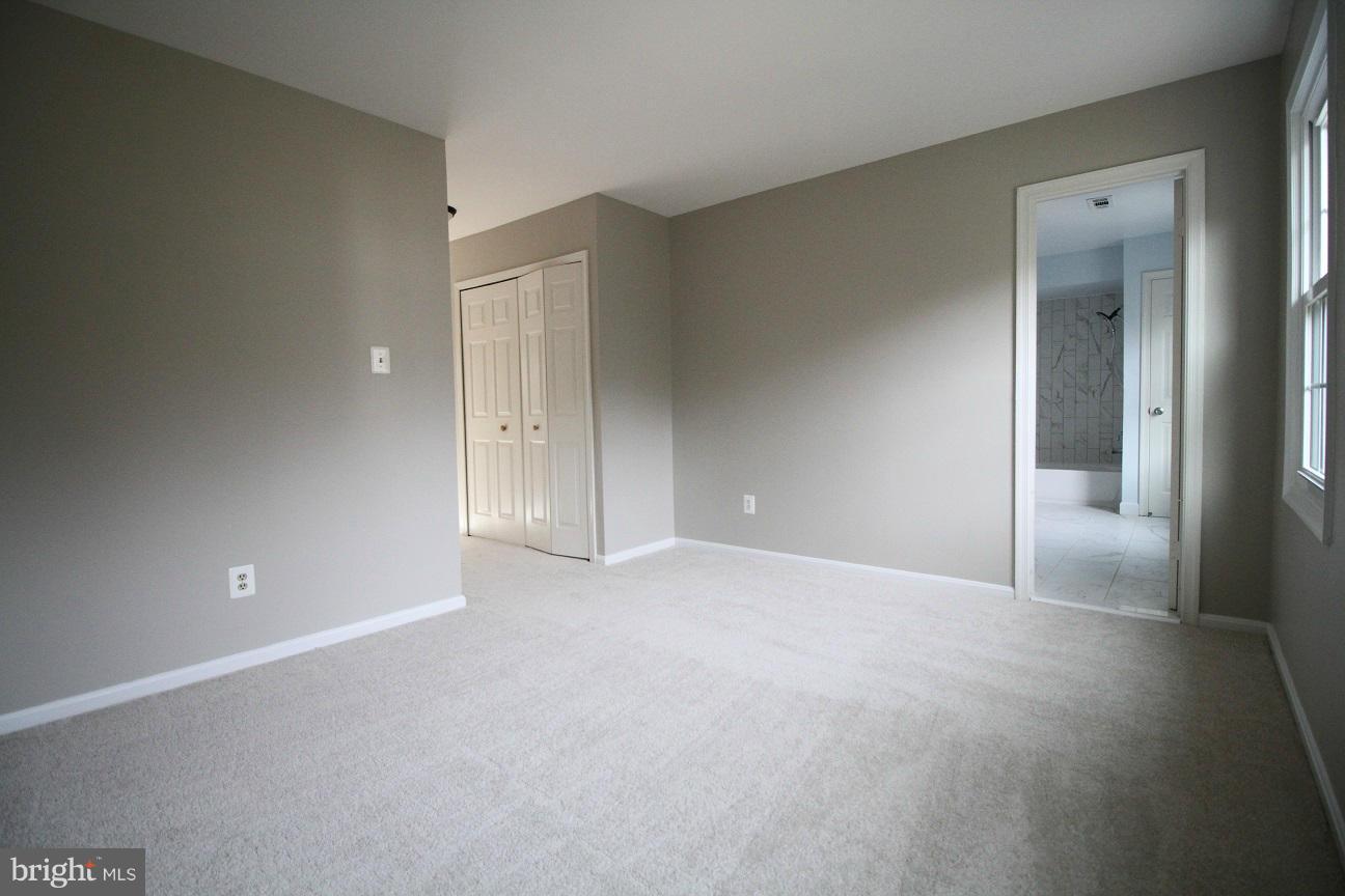 2646 Wild Cherry Place Reston, VA 20191 - Photo 13 of 26 a view of an empty room and closet area