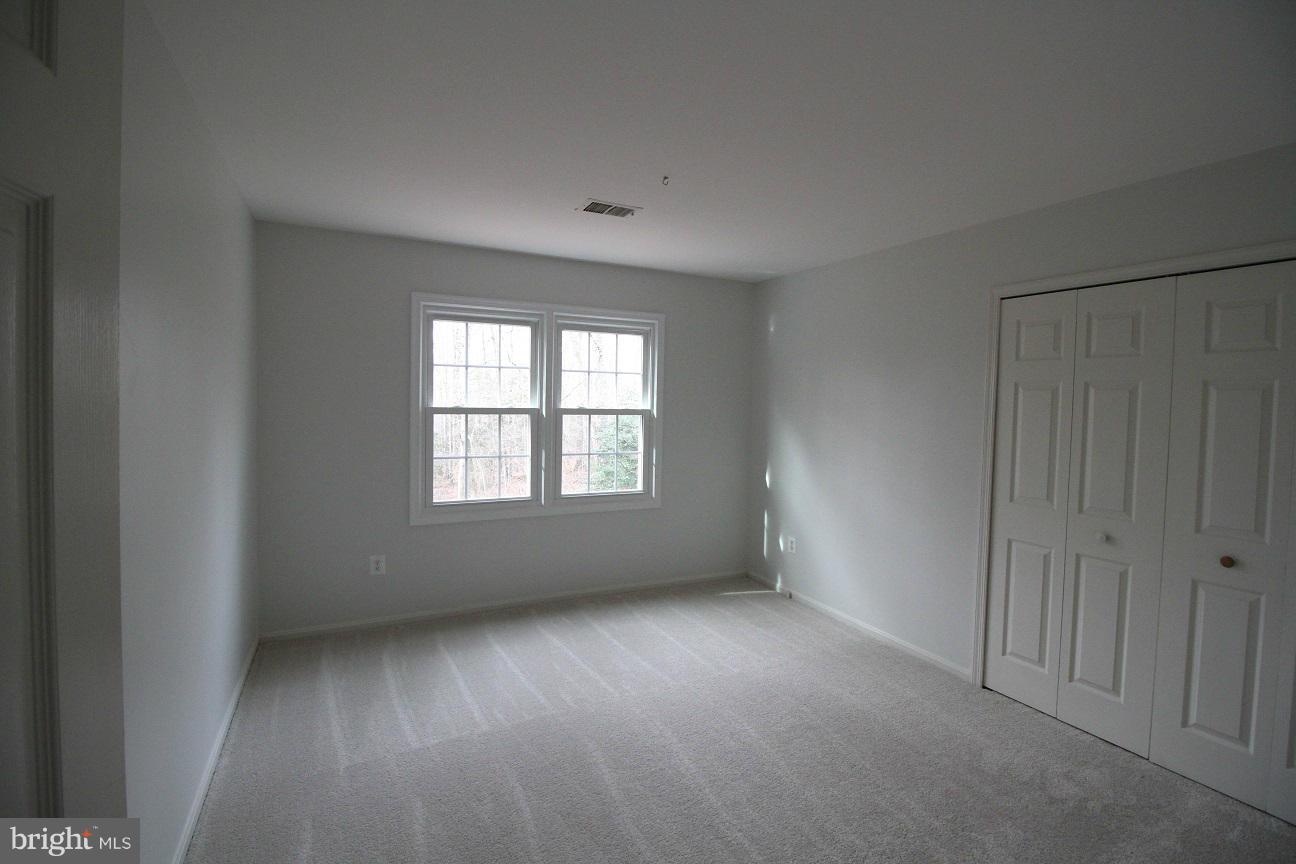2646 Wild Cherry Place Reston, VA 20191 - Photo 17 of 26 an empty room with a window