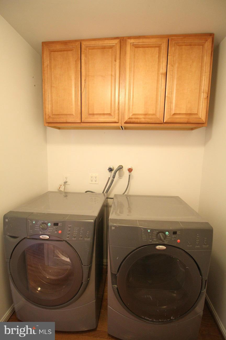 2646 Wild Cherry Place Reston, VA 20191 - Photo 21 of 26 a utility room with a sink