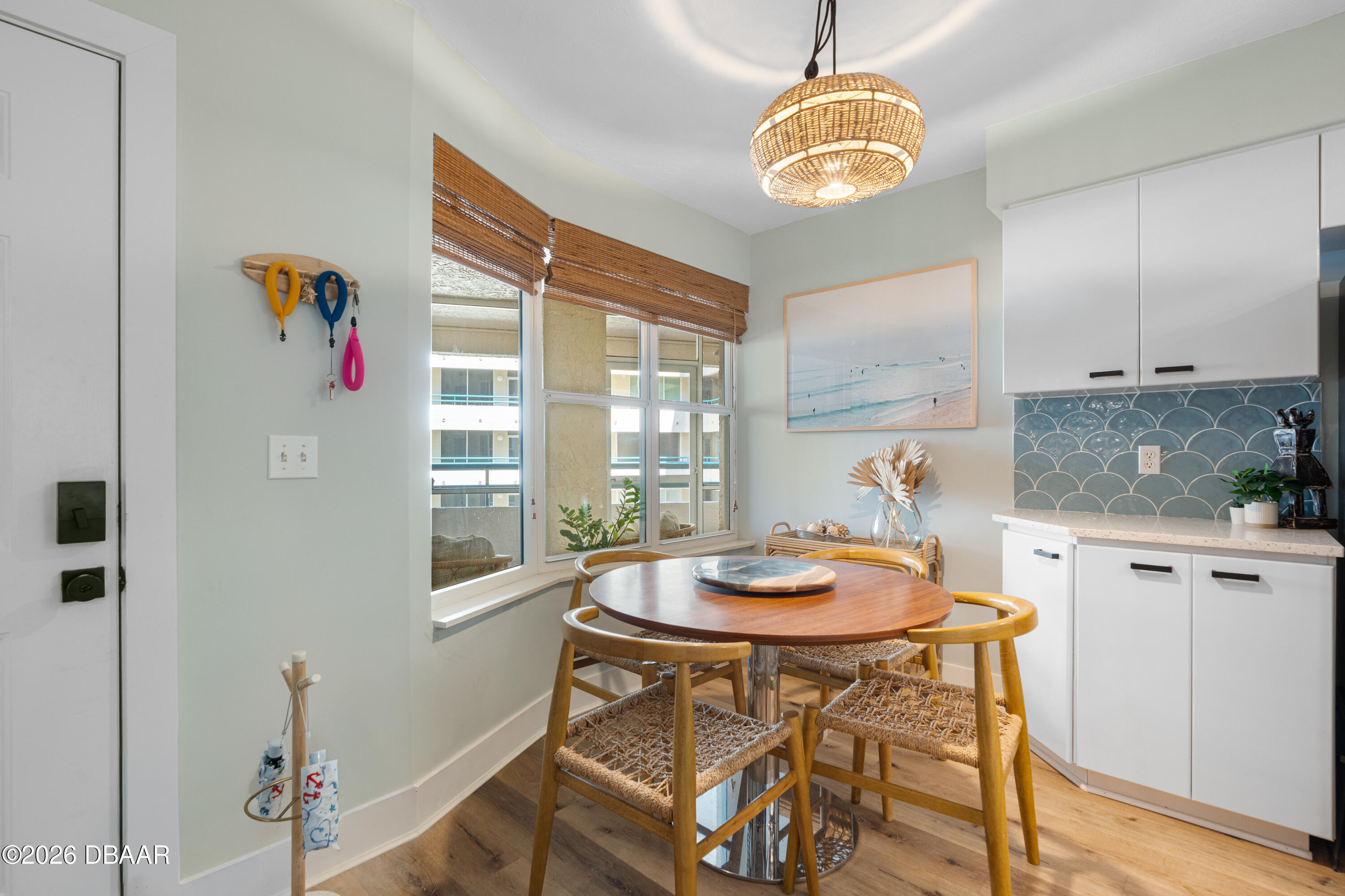 4565 South Atlantic Avenue, Unit 5410 Ponce Inlet, FL 32127 - Photo 15 of 67 a dining room with furniture and window