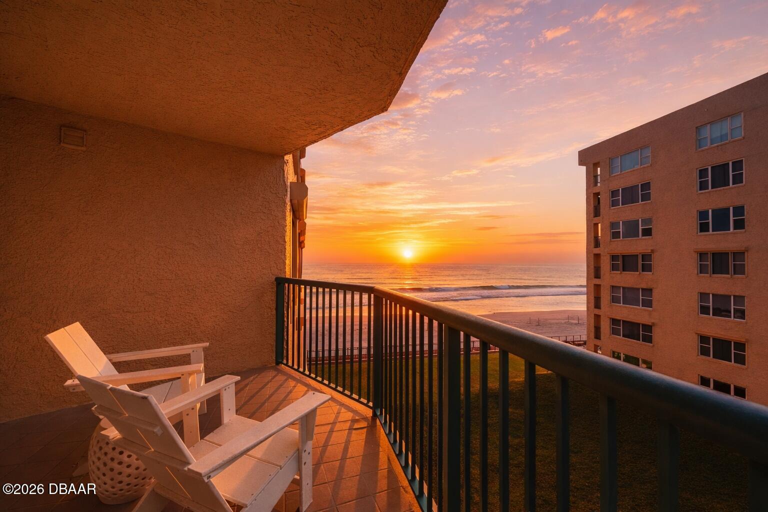4565 South Atlantic Avenue, Unit 5410 Ponce Inlet, FL 32127 - Photo 2 of 67 a balcony with an ocean view