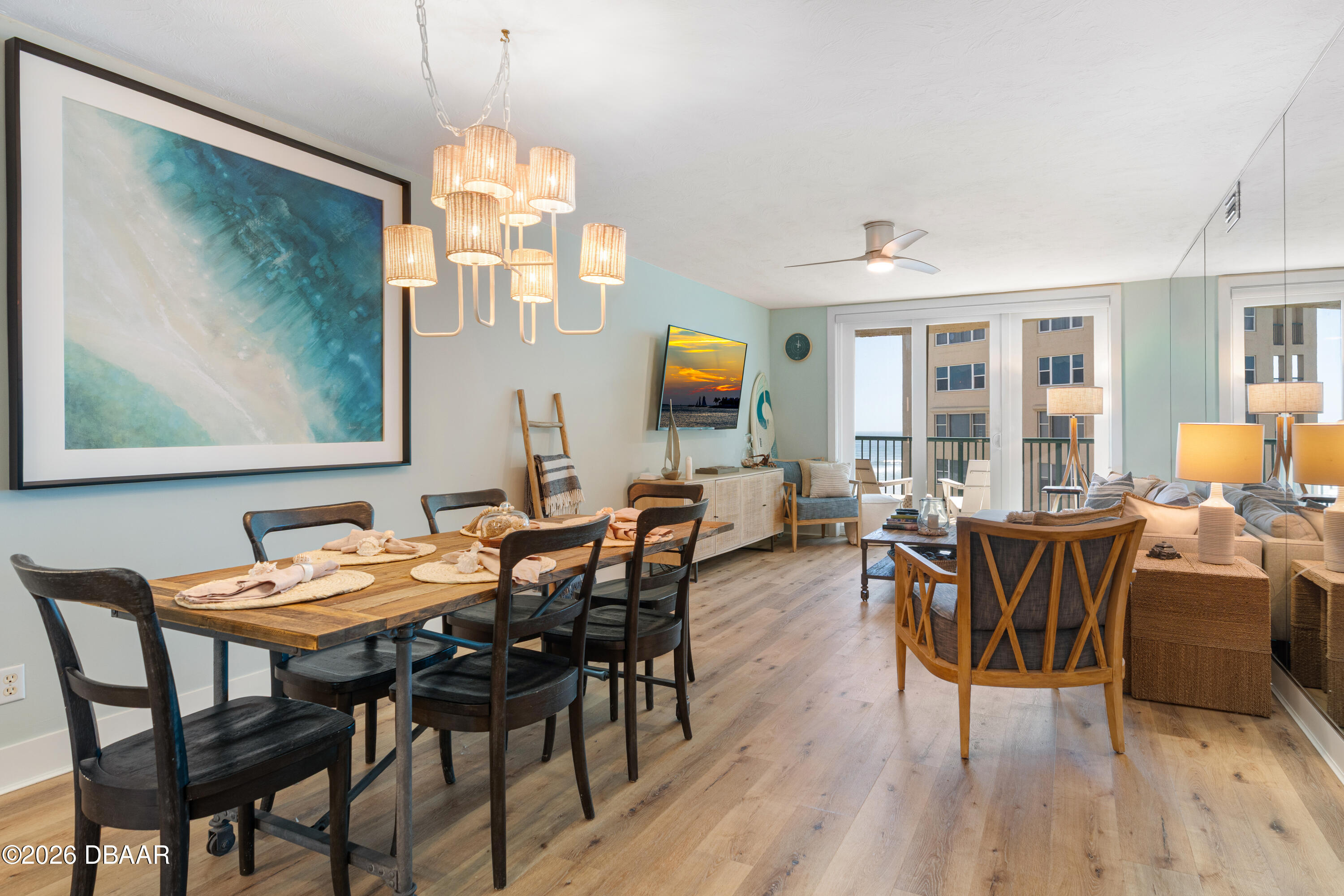 4565 South Atlantic Avenue, Unit 5410 Ponce Inlet, FL 32127 - Photo 22 of 67 a view of a dining room with furniture window and wooden floor