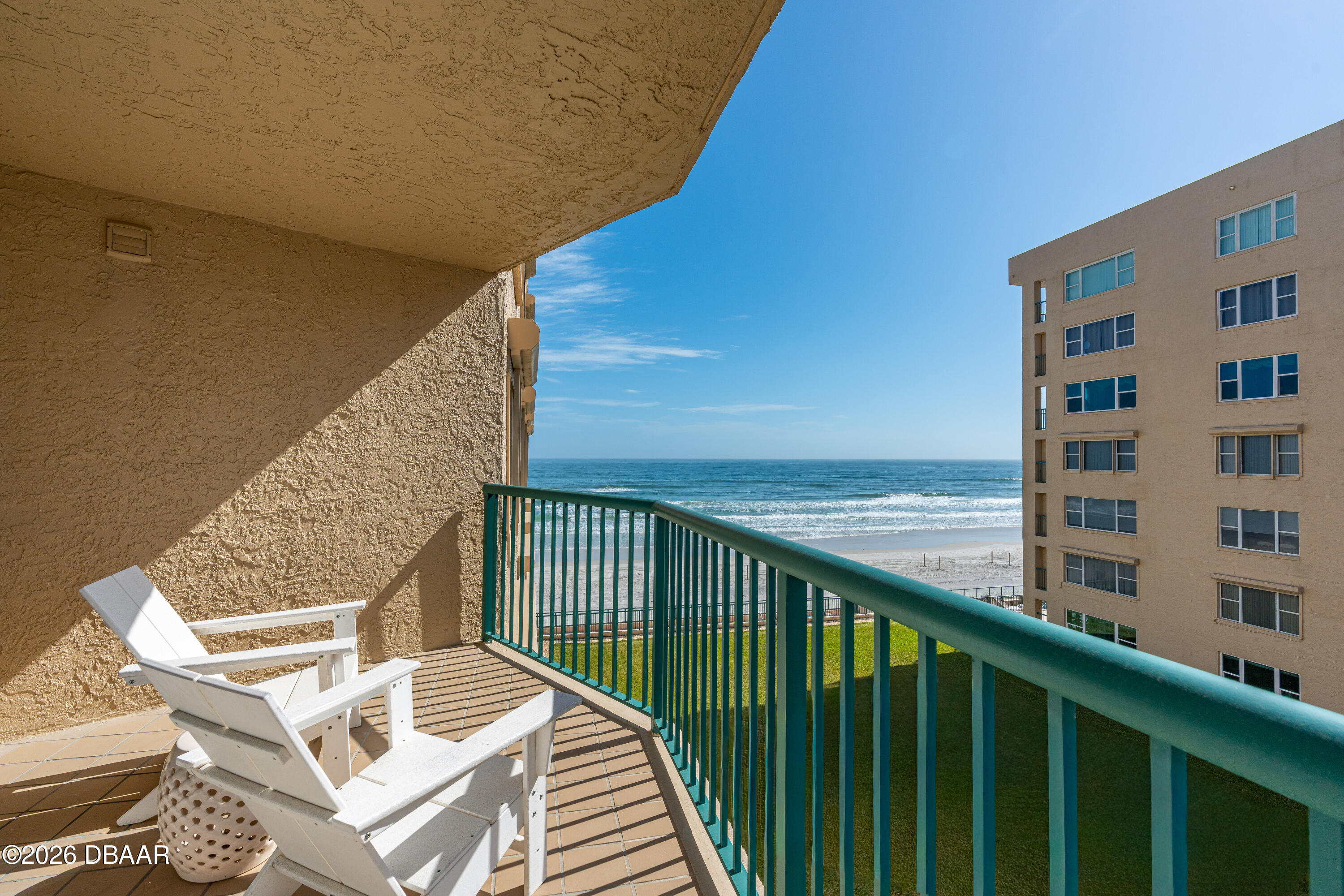 4565 South Atlantic Avenue, Unit 5410 Ponce Inlet, FL 32127 - Photo 25 of 67 a view of balcony with wooden floor and fence