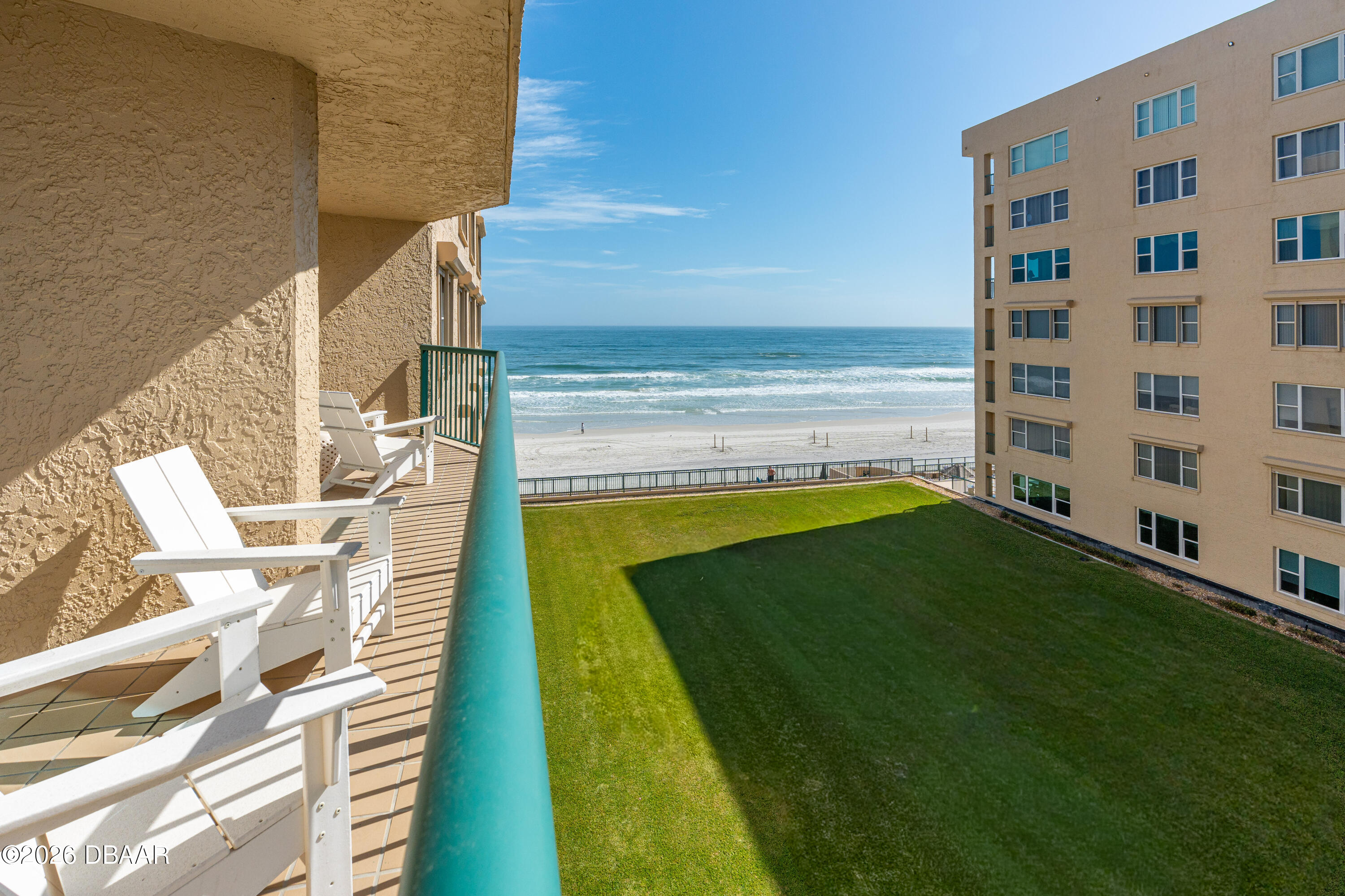 4565 South Atlantic Avenue, Unit 5410 Ponce Inlet, FL 32127 - Photo 33 of 67 a view of a swimming pool with an outdoor space and seating area